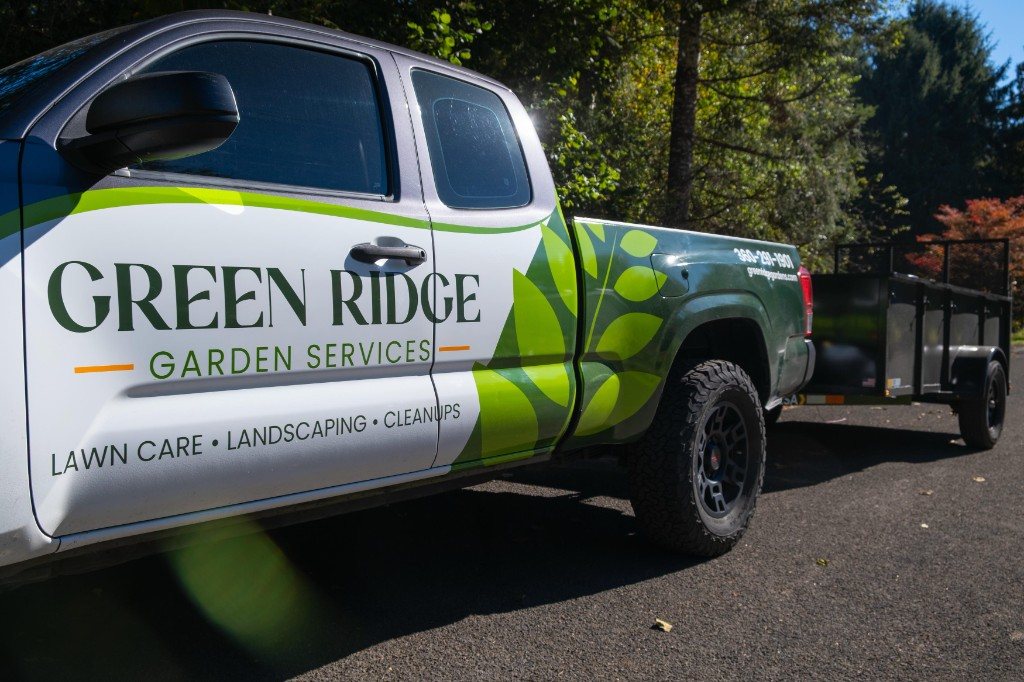 Branded Green Ridge Garden Services truck and trailer